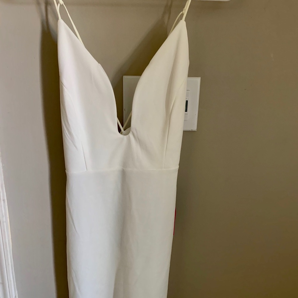 NWT-White bodycon dress - low V w/criss cross back